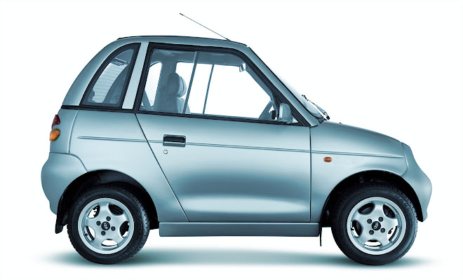Mahindra Reva i (G-Wiz) Car logo for doorstep repair service and roadside assistance near me